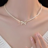 PQT-992 – Bow Shape Pearl Pendant Necklace for Women | Elegant Jewelry in Silver & Golden | Royal Martz