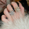 Sparkling Flower Rotating Ring – Adjustable Elegant Spinning Ring for Women | Royal Martz